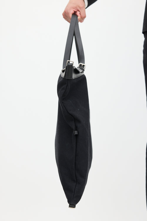 Saint Laurent Black Canvas 
Leather Flat Shop Bag