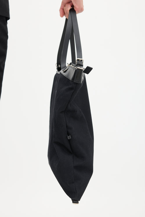 Saint Laurent Black Canvas 
Leather Flat Shop Bag