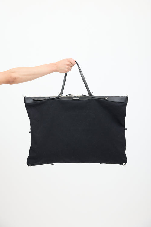 Saint Laurent Black Canvas 
Leather Flat Shop Bag