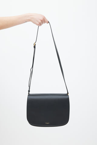 Saint Laurent Black 
Gold Leather Saddle Bag