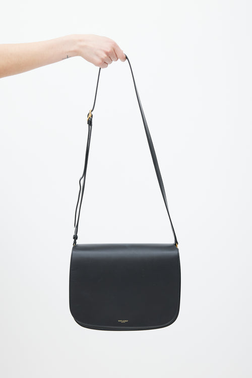 Saint Laurent Black 
Gold Leather Saddle Bag