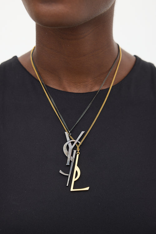 Saint Laurent Black 
Gold Layered Logo Necklace