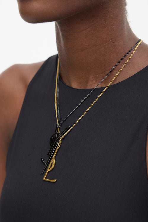 Saint Laurent Black 
Gold Layered Logo Necklace