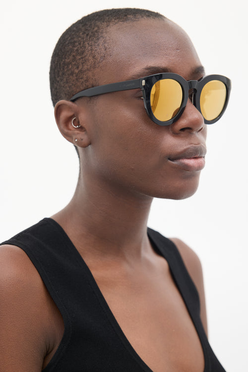 Saint Laurent Black 
Orange SL102 Circular Sunglasses