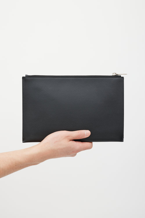 Saint Laurent Black 
Silver Pebbled Leather Clutch