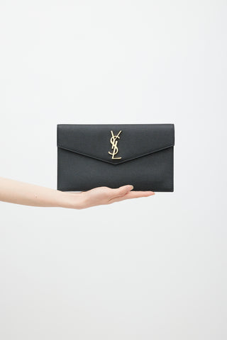 Saint Laurent Black Uptown Monogram Pebbled Leather Clutch