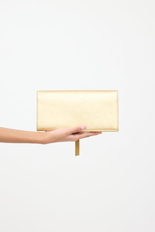 Saint Laurent Gold Leather Kate Tassel Clutch