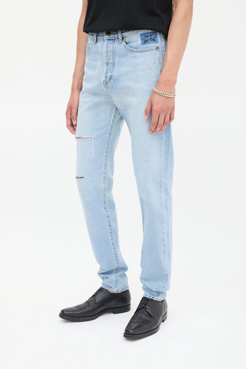 Saint Laurent Light Wash Distressed 
Embroidered Slim Jeans