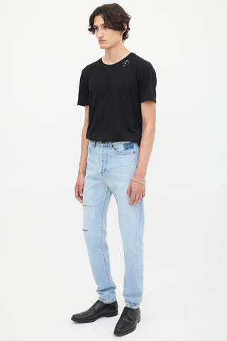 Saint Laurent Light Wash Distressed 
Embroidered Slim Jeans