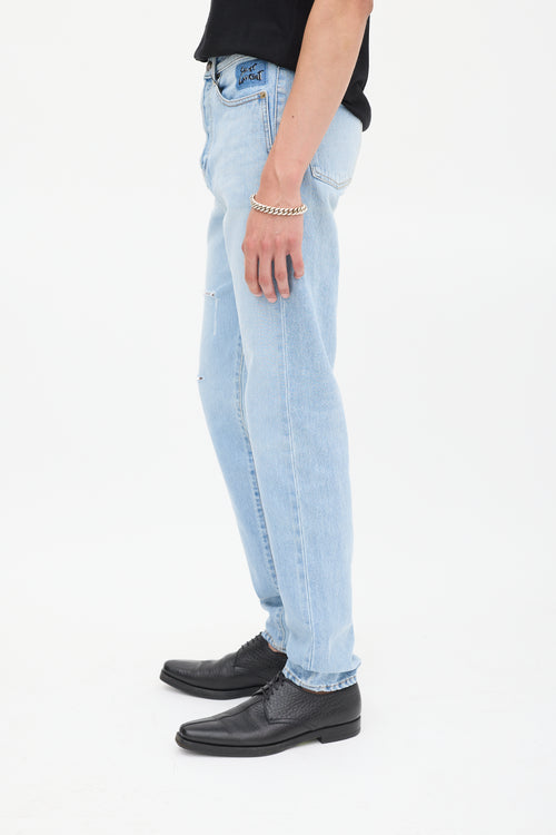 Saint Laurent Light Wash Distressed 
Embroidered Slim Jeans