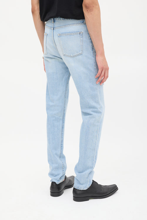 Saint Laurent Light Wash Distressed 
Embroidered Slim Jeans