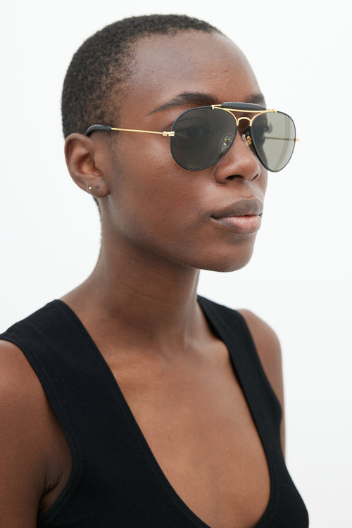 Saint Rita Parlor Black 
Gold Aviator Sunglasses