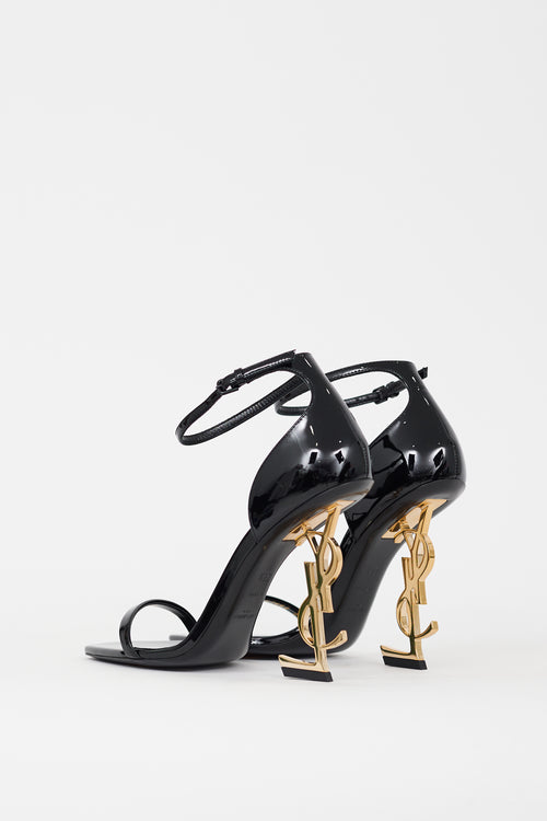 Saint Laurent Black 
Gold Opyum 100 Logo Sandal