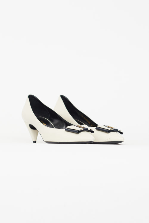 Saint Laurent Cream 
Black Pointed Toe Heel