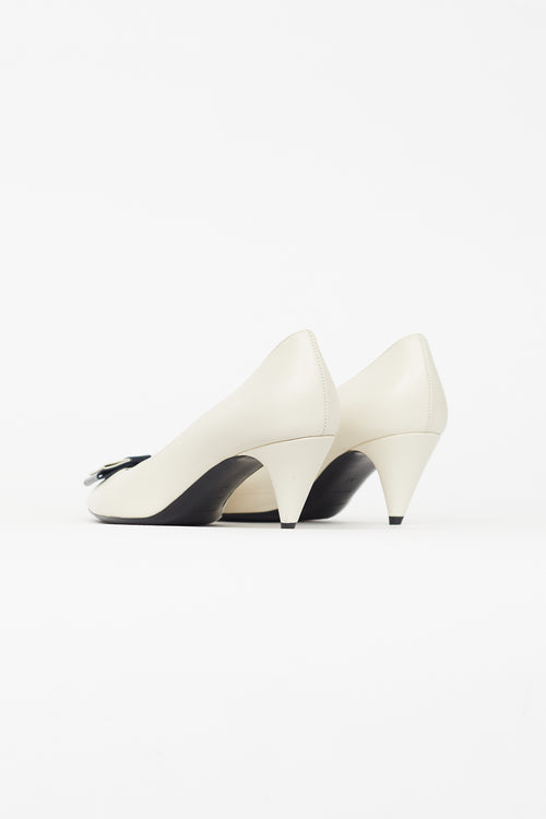 Saint Laurent Cream 
Black Pointed Toe Heel