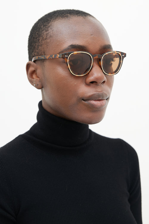 Saint Rita Parlor Brown 
Gold Diebold Circular Sunglasses