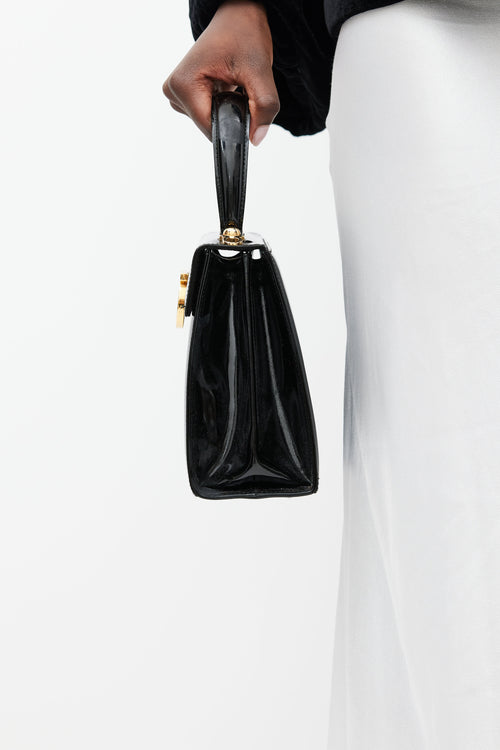 Ferragamo Black 
Gold Iconic Patent Leather Bag