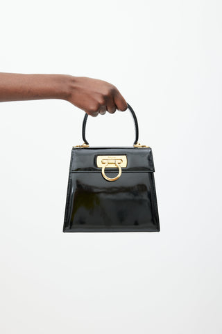 Ferragamo Black 
Gold Iconic Patent Leather Bag