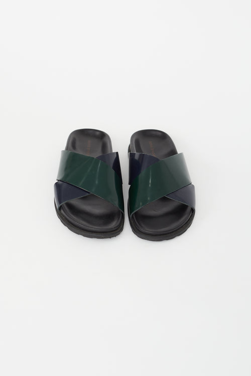 Sofie D
Hoore Navy 
Green Leather Criss Cross Slide