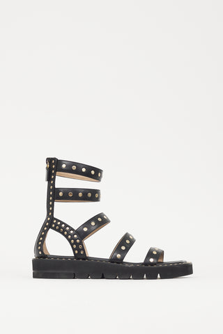 Stuart Weitzman Black 
Gold Studded Gala Lift Sandal