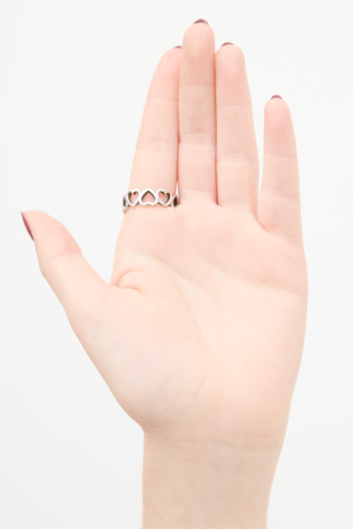 Tiffany 
Co. Sterling Silver 
Rose Gold Open Hearts Ring