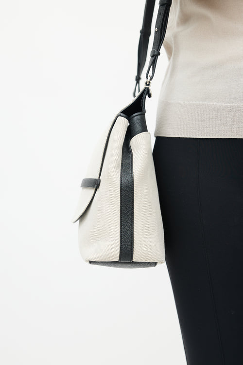 The Row Beige 
Black Canvas Sideby Bag