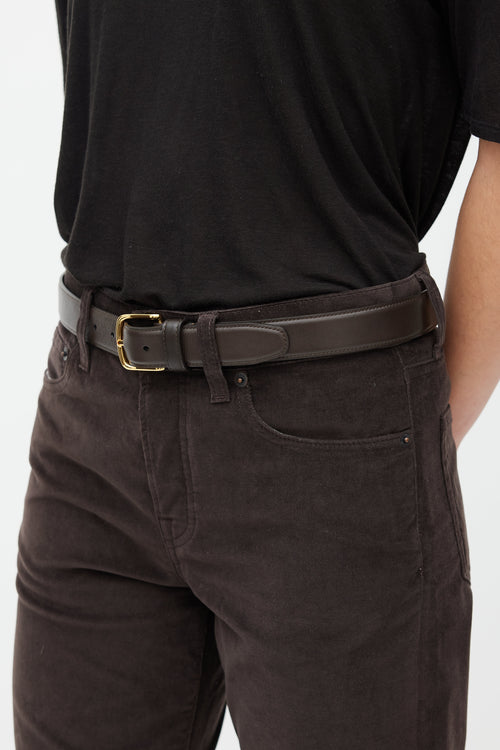 The Row Brown 
Gold Leather Belt