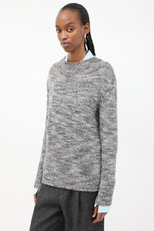 The Row Grey 
Multi Speckled Wool Mock Neck Sweater