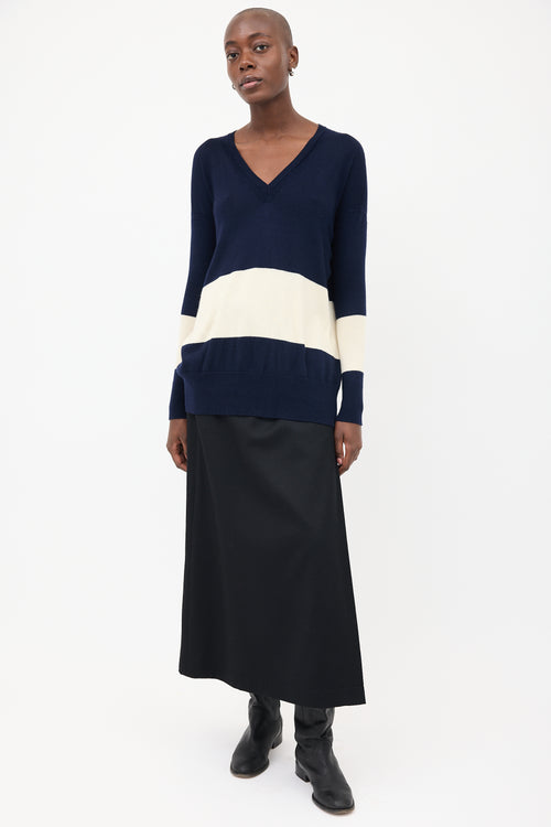 The Row Navy 
Cream V-Neck Sweater