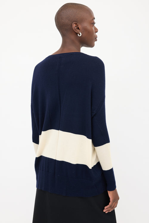 The Row Navy 
Cream V-Neck Sweater