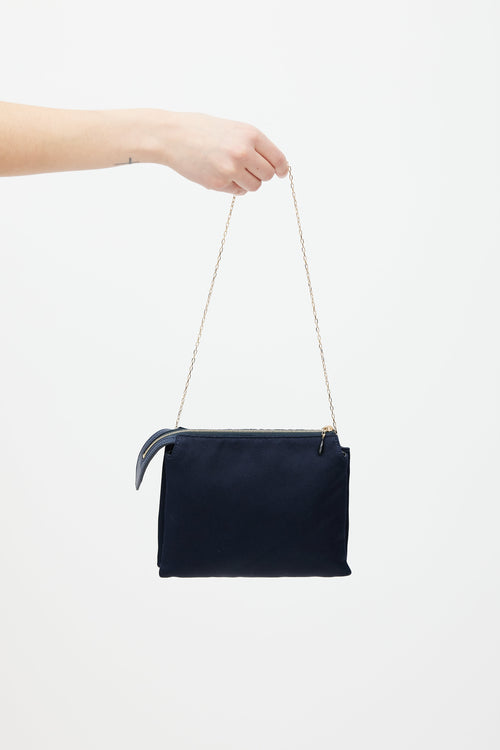 The Row Navy 
Gold Nu Twin Woven Bag