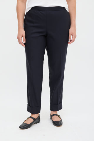 The Row Navy Wool 
Silk Tapered Trouser