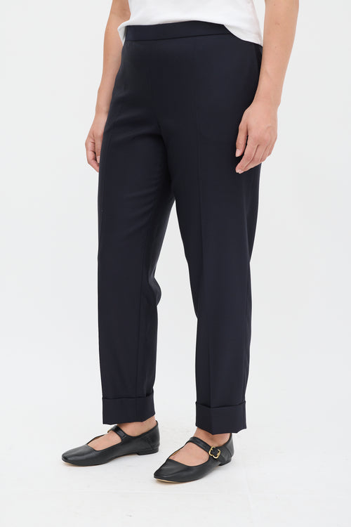 The Row Navy Wool 
Silk Tapered Trouser