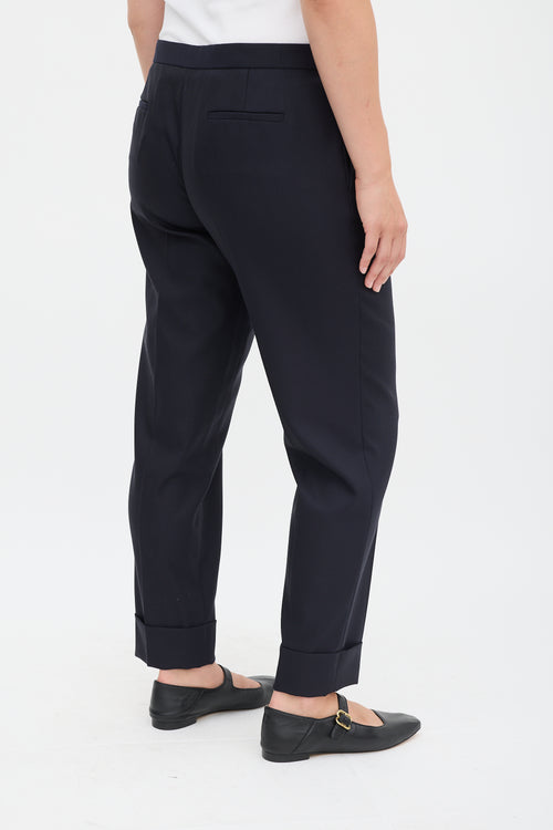 The Row Navy Wool 
Silk Tapered Trouser