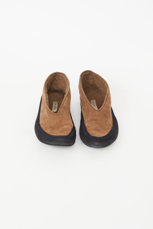 The Row Brown 
Black Fairy Shearling Flat