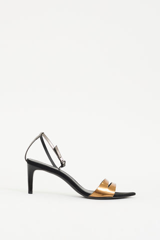 Tibi Black 
Gold Leather Sandal