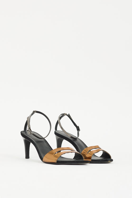 Tibi Black 
Gold Leather Sandal