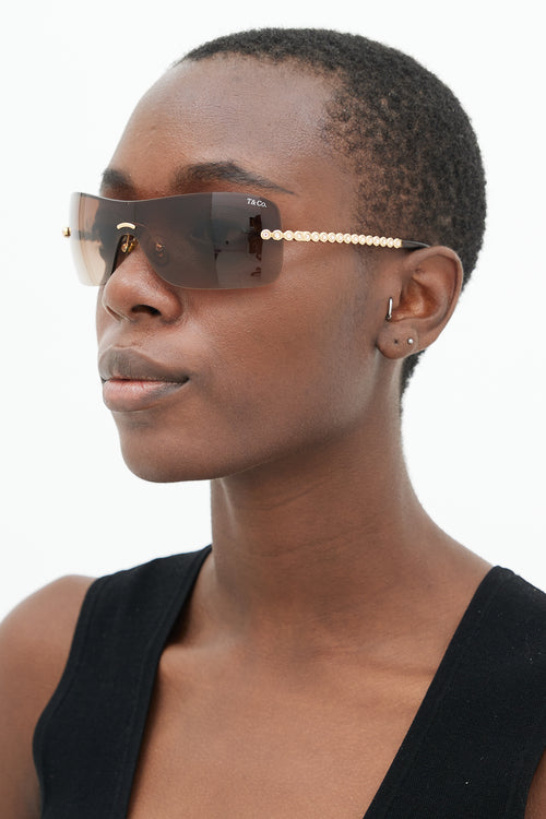 Tiffany 
Co. Brown TF3002-B Rimless Shield Sunglasses