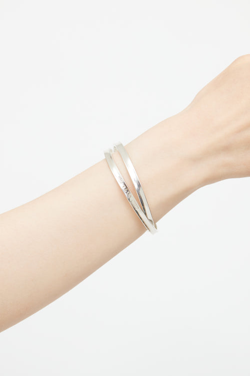 Tiffany 
Co. Sterling Silver Interlocking Bangle