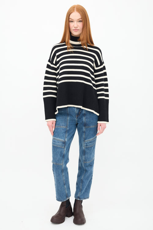 Toteme Black 
White Striped Turtleneck Sweater