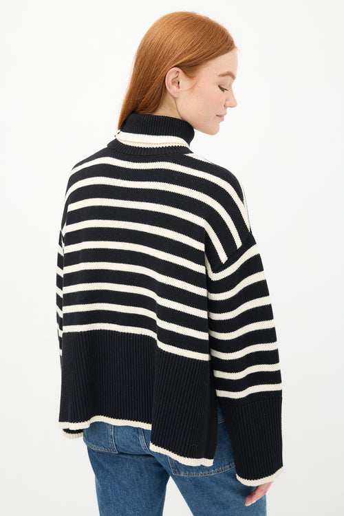 Toteme Black 
White Striped Turtleneck Sweater