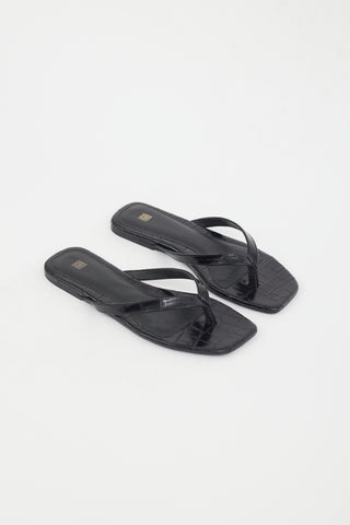 Totême Black Shiny Leather Embossed Flip Flops