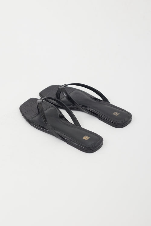 Totême Black Shiny Leather Embossed Flip Flops