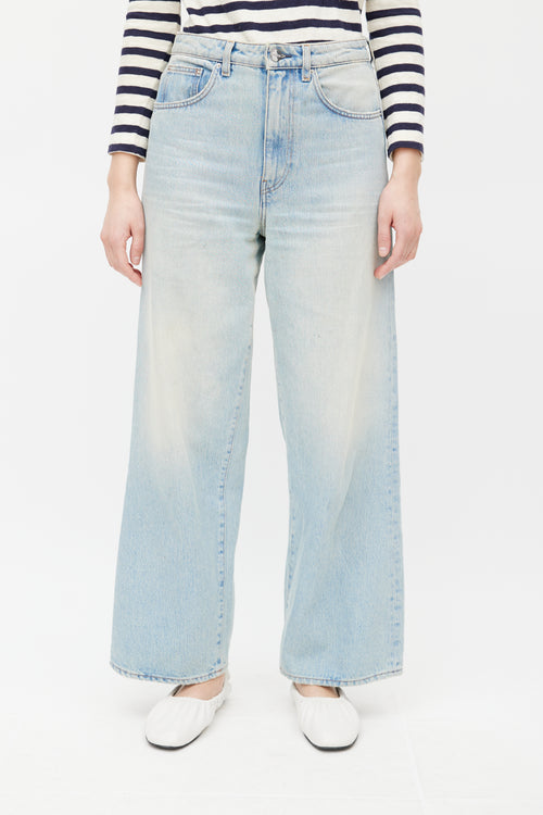 Totême Light Wash Flare Denim Jeans