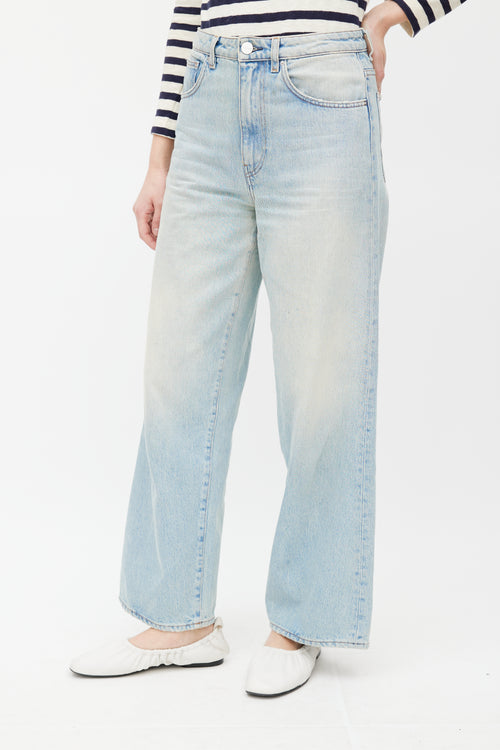 Totême Light Wash Flare Denim Jeans