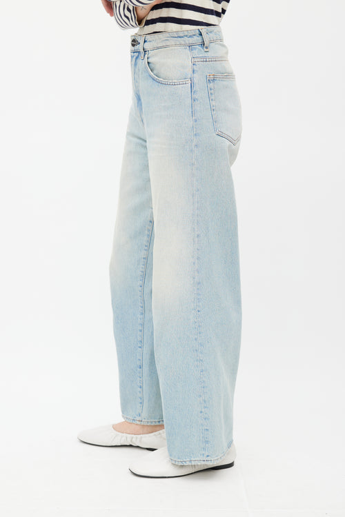 Totême Light Wash Flare Denim Jeans