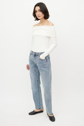 Totême Light Wash Twisted Seam Jeans