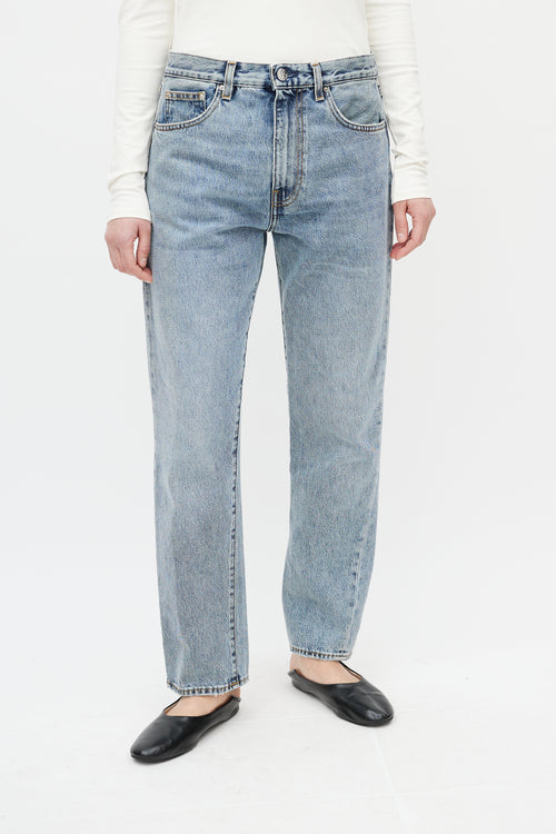 Totême Light Wash Twisted Seam Jeans