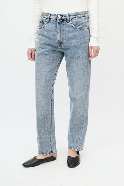 Totême Light Wash Twisted Seam Jeans