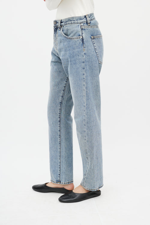 Totême Light Wash Twisted Seam Jeans